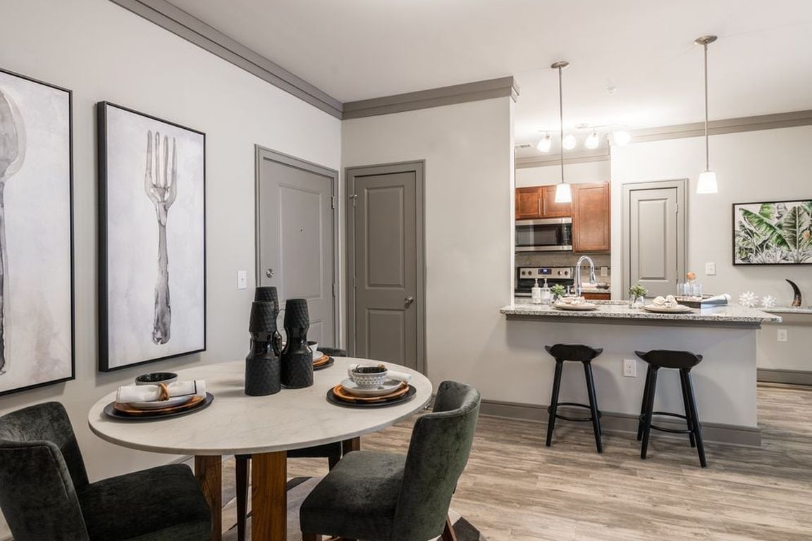 Kitchen and dining areas with hard-surface vinyl plank flooring