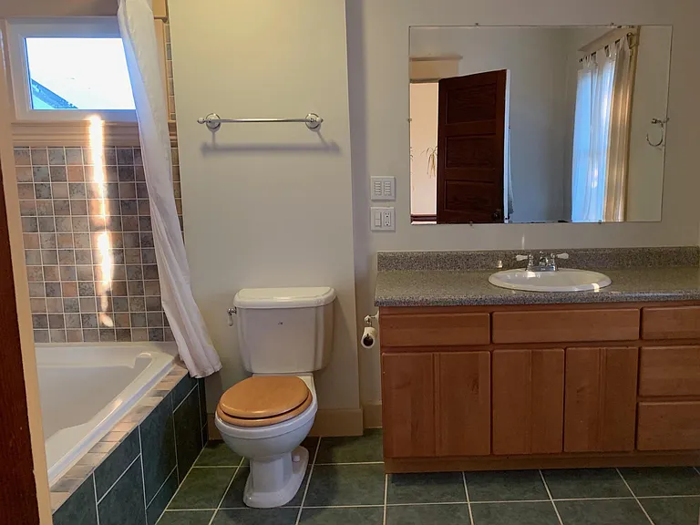 Upstairs bathroom with large soaking tub