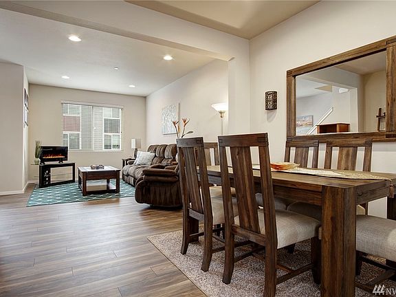 A fantastic floor plan with lots of natural and recessed lighting!  Gorgeous and durable floors and all neat as a pin!