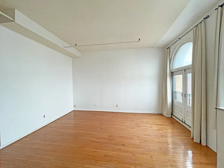 Spacious 16 ft. x 16.4 ft. living area with high ceiling