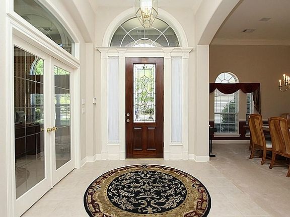 Open Entryway With Formal Dining