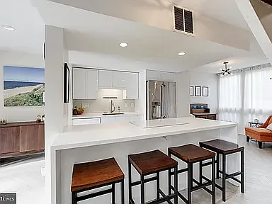 Kitchen area and designer dining island