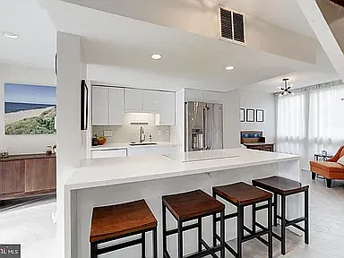Kitchen area and designer dining island
