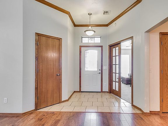 Entry with coat closet
French doors for 4th Bedroom/ Office/ Guest Room