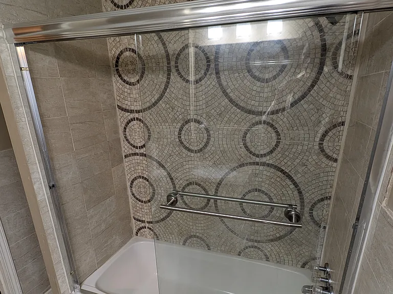 Tiled Tub Shower Area.