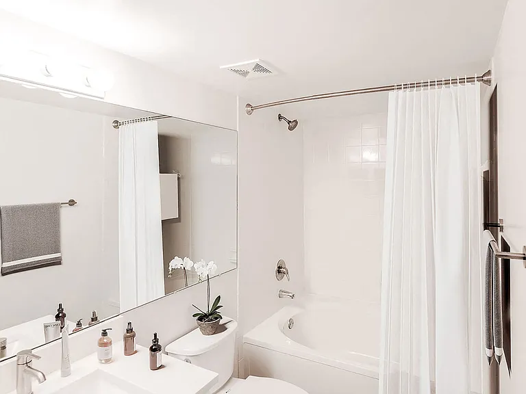 Spacious spa-inspired bathrooms with garden soaking tubs