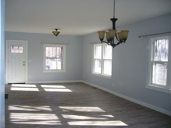 View of Front Door From Kitchen-Looking through Dining Room and Living Room