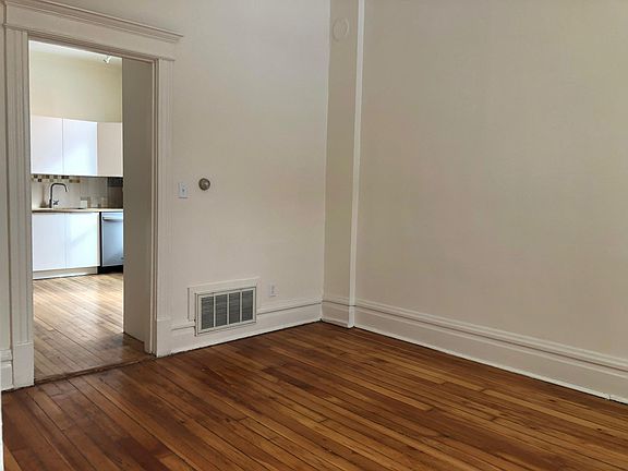 Living room looking into kitchen.