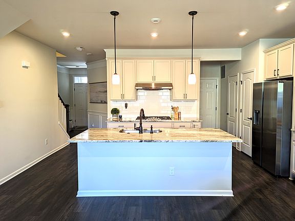 White cabinets and granite counter tops