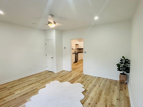 Living room looking into kitchen