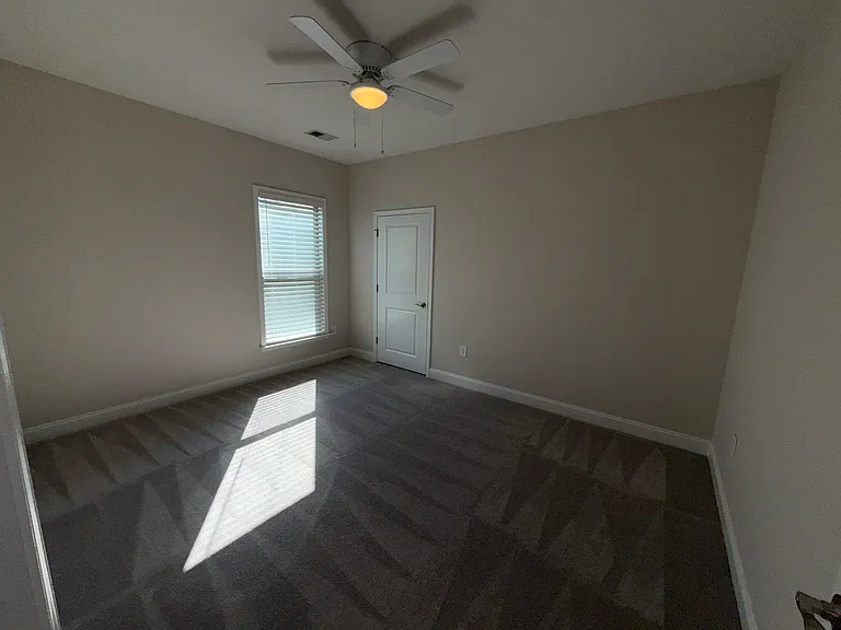 2nd Bedroom with Ceiling Fan and Brand New Carpet and Pad