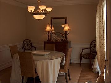 Dining Room to the right of the front door, and leads into the kitchen