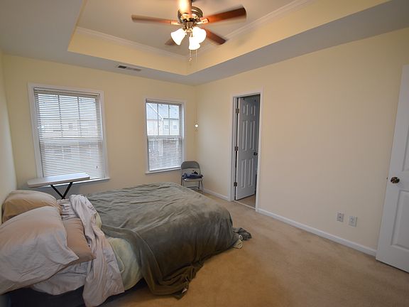 Master bedroom with vaulted ceilings