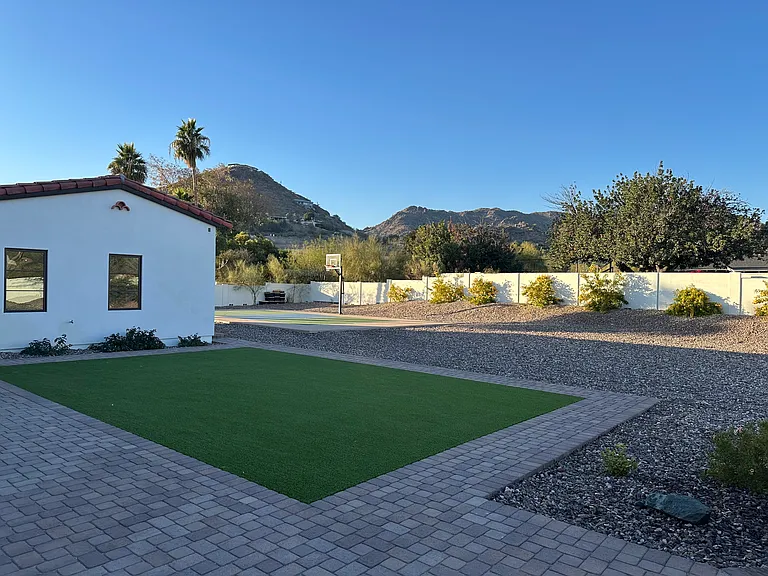 lawn panel and view of sport court/ auxiliary bedrooms from near outdoor master "flex" room area