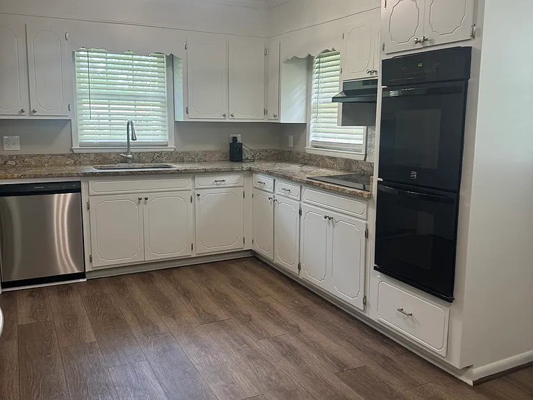 Painted kitchen cabinets double oven dishwasher and smooth top stove