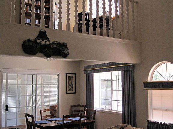 Formal dinning area with loft above