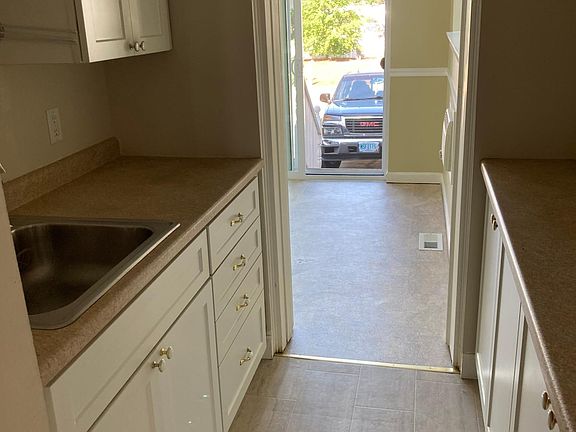 Pantry leading between kitchen and sunroom
