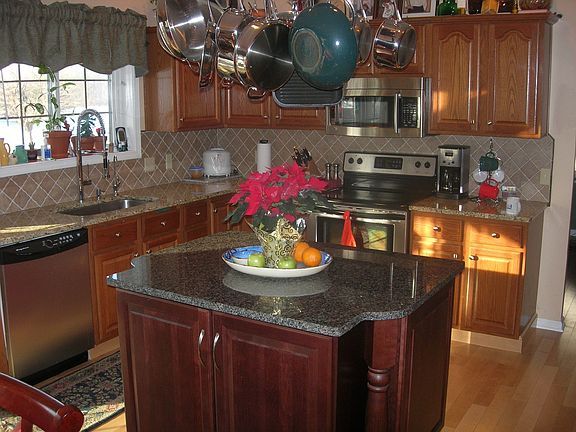 Kitchen w/ granite tops