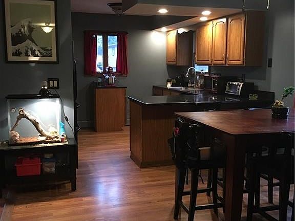 KITCHEN AND EATING AREA ON FIRST FLOOR