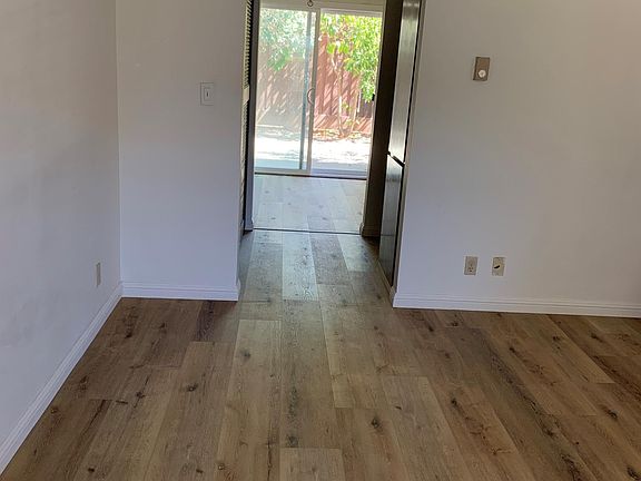 View from living room towards kitchen and backyard