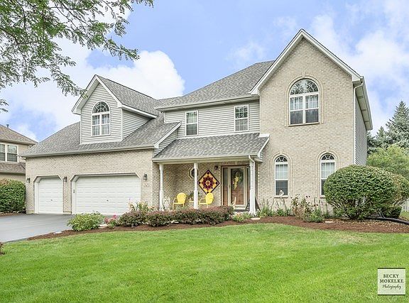 The yard has been landscaped to perfection and is gorgeous.