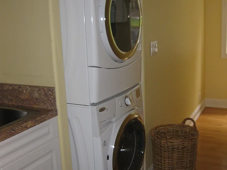 Stacked washer & dryer.