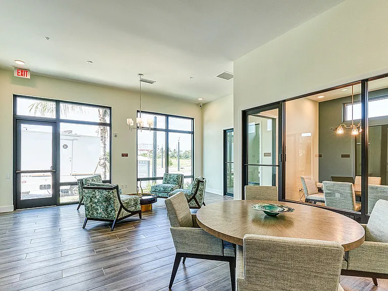 Imperial Crossing Luxury Apartment Homes community clubhouse seating area.