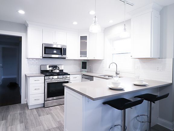 4th image of 8727 N Ozanam Ave