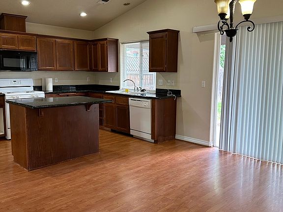 vaulted kitchen and dining area