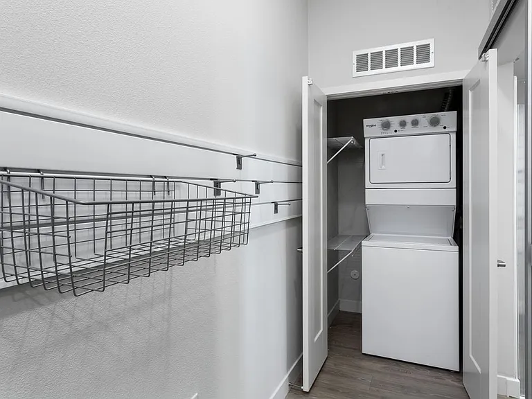 Building B apartment home gear wall and in-home washer and dryer