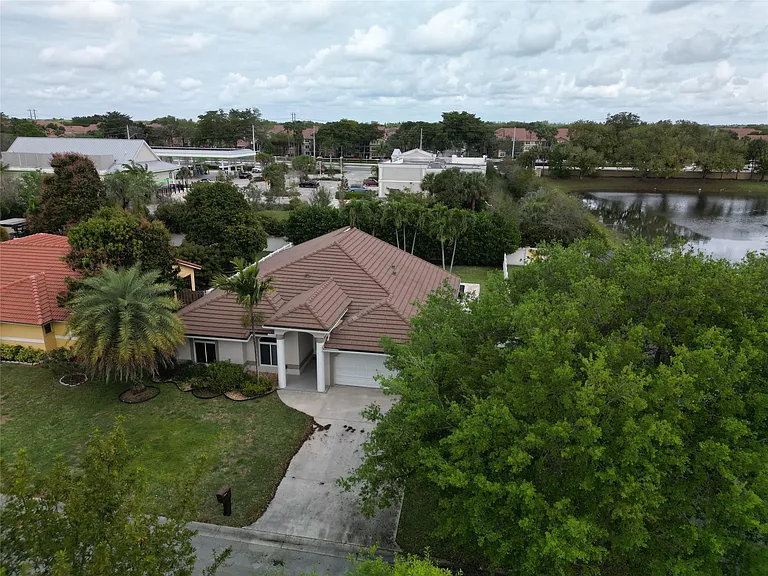8949 NW 45th Ct — Photo 27
