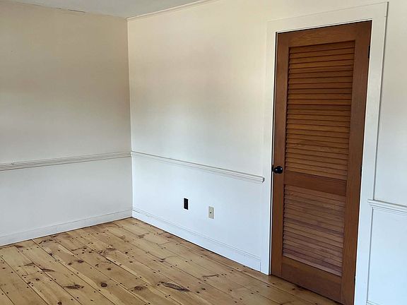 Living room with closet.