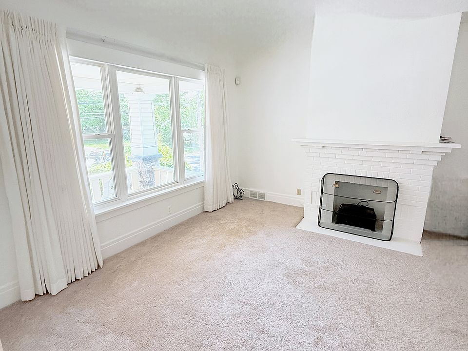 Living Room; features premium custom blinds
