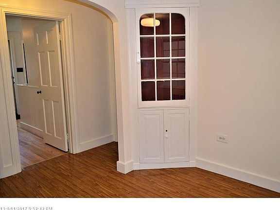 Curved entrance, built in china Cabinet and a pass through from the kitchen to this dining room give witness to the care and detail taken in the building of this Builder, one family owned, Littlefield home.