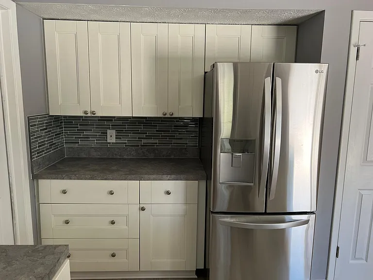 New cabinets.and appliances. With large pantry.