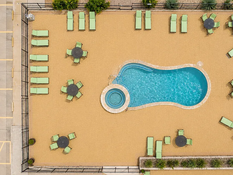 Unwind after work or long shifts in the resort-style pool and hot tub.