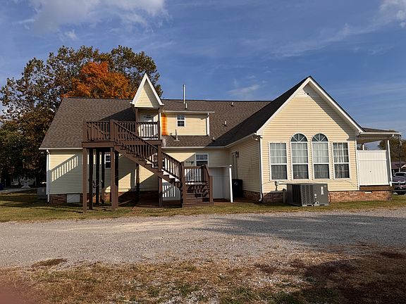 Picture of the upstairs apartment from the back. Entrance is in the back up the stairs.