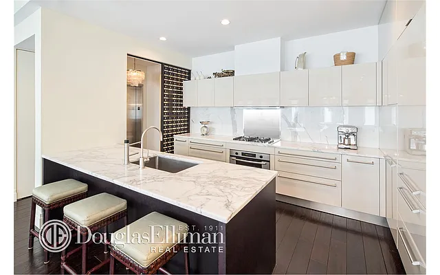 Sold by Douglas Elliman | media 12