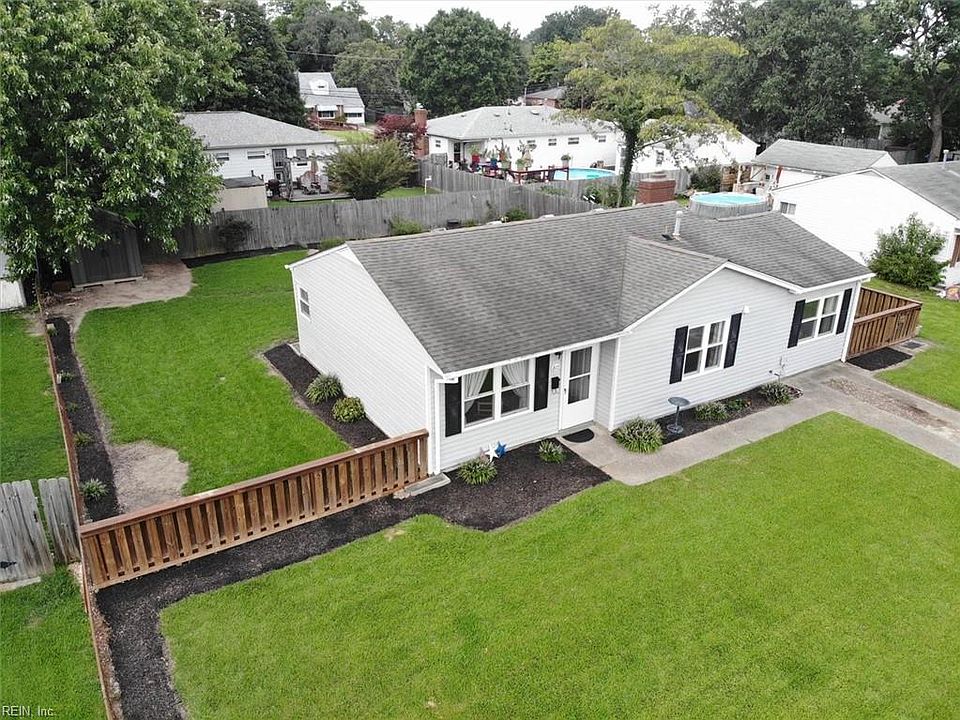 HUGE front & back yard with Lush St. Augustine grass. 
