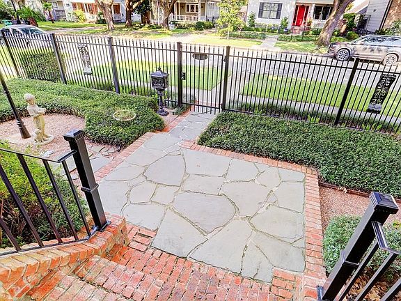 Gated entry, fully fenced and beautifully landscaped.
