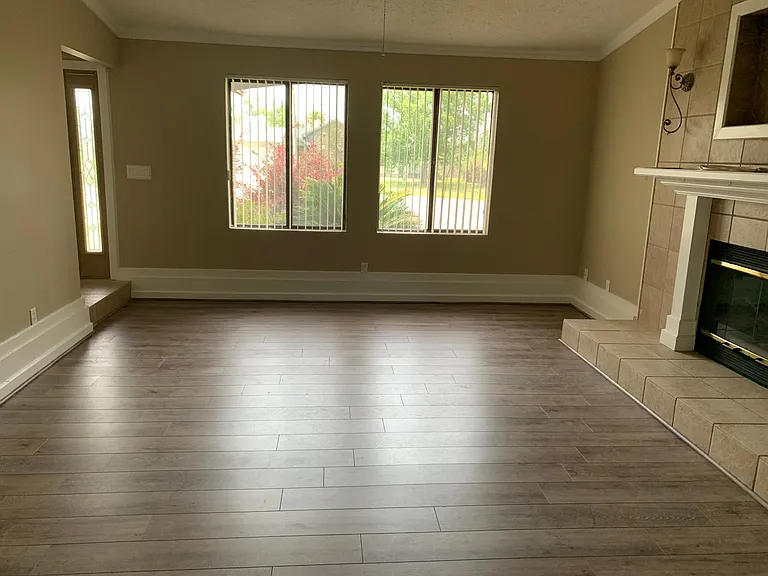 Living-room while standing in front of the back French doors.
