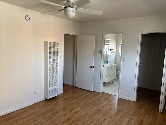 MASTER BEDROOM 4 WITH DOOR TO THE ROOM, DOOR TO THE MASTER BATHROOM & DOOR TO THE WALK-IN CLOSET IN VIEW