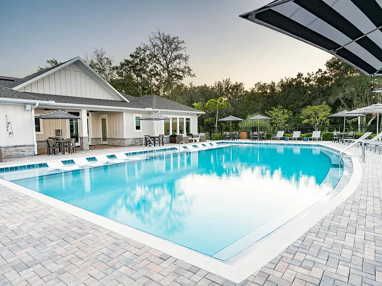 Refreshing poolside spaces at Amavi Kissimmee keep you close to local attractions, offering a relaxing retreat at the heart of this connected Florida community.