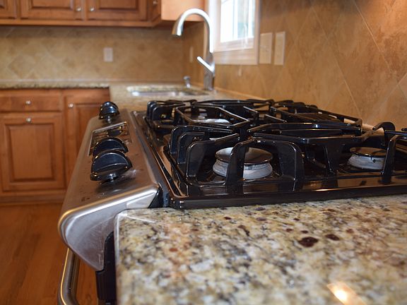 Gas range, tile backsplash