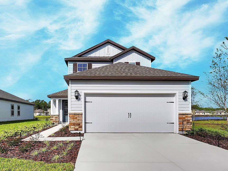 The Tomoka is a beautiful homes with front yard landscaping