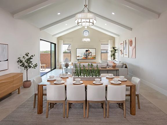 Dining area with vaulted ceiling