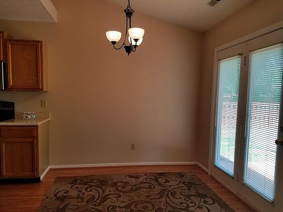 Breakfast Nook open to kitchen and looks out onto deck