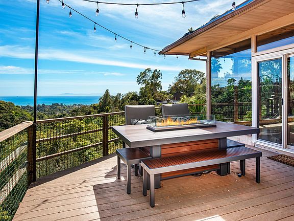 View from main deck with fnew irepit table.