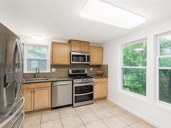 4th image of 6607 NW Quail Run Dr