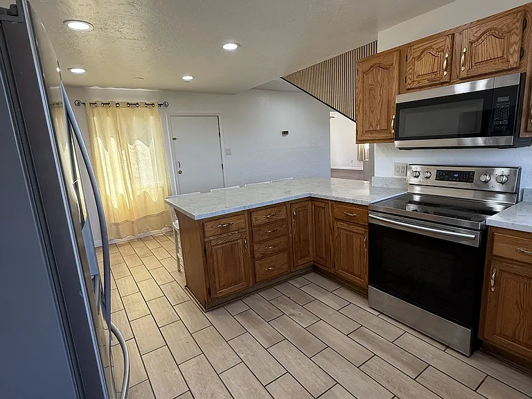 Kitchen/New Peninsula Counters/Electric Stove & Microwave